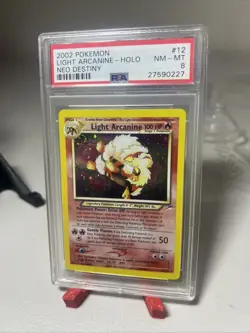 Pokemon TCG Light Arcanine Neo Destiny Holo Card 12/105 PSA 8- Half Swirl - Image 1