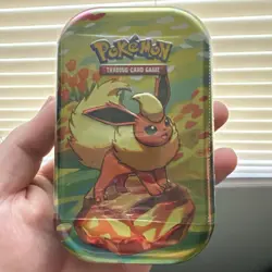 Pokemon TCG Scarlet & Violet Prismatic Evolutions Sealed Tin Flareon - Image 1