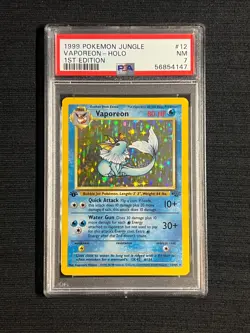 PSA 7 NM Vaporeon Holo 12/64 1st Edition Jungle 1999 Pokemon WOTC - Image 1