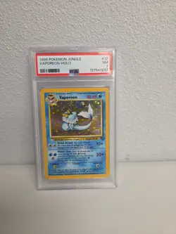 1999 Pokemon Jungle 12/64 - Vaporeon-Holo PSA 7 - Image 1
