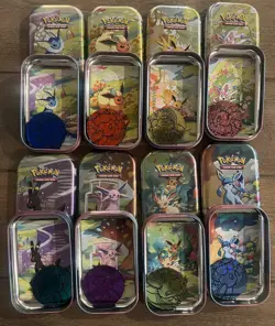 Prismatic Evolutions *EMPTY* Mini Tin Complete Set Of 8 (Tin + Card + Coin) - Image 1