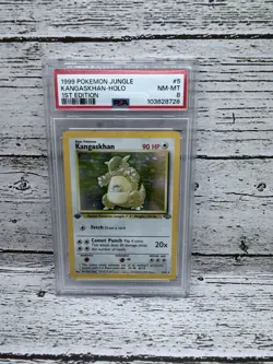 1999 POKEMON KANGASKHAN 1ST EDITION JUNGLE HOLO PSA 8 Vintage - Image 1