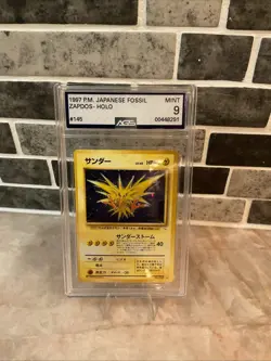 1997 Pokemon Pocket Monsters Japanese Fossil Zapdos Holo - AGS Mint 9 - Image 1