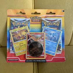 Pokemon Box With Two Packs And Three Foil Promo Cards - Image 1