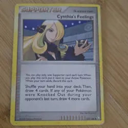 Pokemon Cynthia's Feelings Trainer-Supporter Cosmos Holo 131/146 Legends Awaken… - Image 1