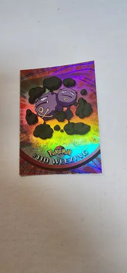 Topps Pokemon Foil Weezing #110 1998 Series 2 TV Animation Rainbow Foil - Image 1