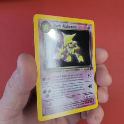 5-12-23 . UNPLAYED pokemon . team rocket #1/82 . 2000 dark alakazam holo (64) - Image 2