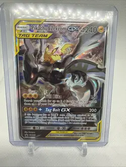 Pokemon TCG Pikachu & Zekrom GX Black Star Promo Card SM168 LP/MP - Image 1