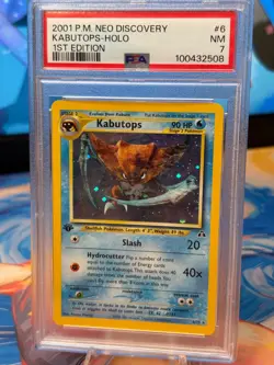 SWIRL! 1st Edition Kabutops 6/75 Neo Discovery Holo Pokemon Card PSA 7 - Image 1