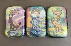 Pokemon TCG Scarlet & Violet Prismatic Evolutions Sealed Mini Tin - 3 Available - Image 1
