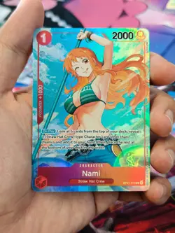 One Piece OP01-016 Romance Dawn Nami Pre-Errata Alt Alpha " Reveal 1 " - Image 1