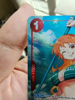 One Piece OP01-016 Romance Dawn Nami Pre-Errata Alt Alpha " Reveal 1 " - Image 2