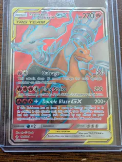 Reshiram & Charizard GX Full Art Holo Card 194/214 Sun and Moon Unbroken Bonds - Image 1