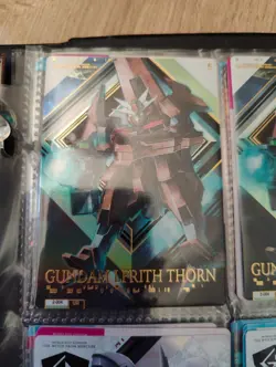 Gundam Card Collection THE WITCH FROM MERCURY UR 2-004 GUNDAM LFRITH THORN - Image 1