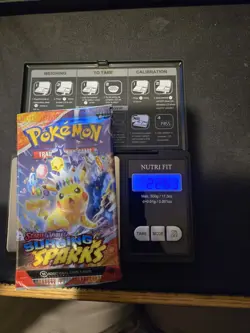(HEAVY)🔥 22.63g Pokemon TCG Surging Sparks Booster Pack Factory Sealed - Image 1