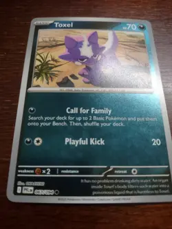 Toxel 067/094 Me02: Phantasmal Flames Reverse Holo pokemon Card - Image 1