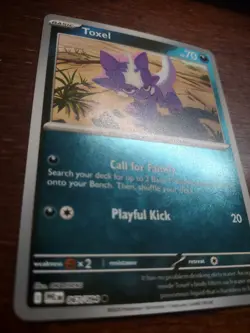 Toxel 067/094 Me02: Phantasmal Flames Reverse Holo pokemon Card - Image 2
