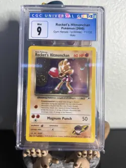 SWIRL - CGC 9 Pokemon TCG Rocket's Hitmonchan Gym Heroes 11/132 Holo Unlimited - Image 1
