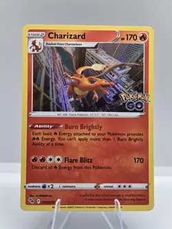 POKEMON CHARIZARD #010/078 RARE HOLOFOIL NM POKEMON GO CARD - Image 1