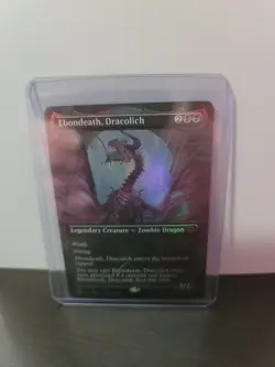 FOIL Ebondeath, Dracolich (Borderless) – Adventures in the Forgotten Realms - Va - Image 1