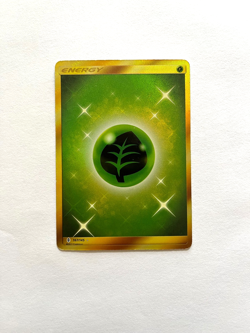 Grass Energy (Secret) 167/145 Sm-Guardians Rising Holo Ultra rare Pokemon card - Image 1