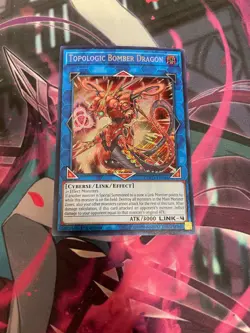 YUGIOH - TOPOLOGIC BOMBER DRAGON - SECRET RARE - COTD - 1ST ED - NM - Image 1