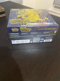 Pokemon Surging Sparks POKEMON CENTER ETB – Factory Sealed – Brand New - Image 3