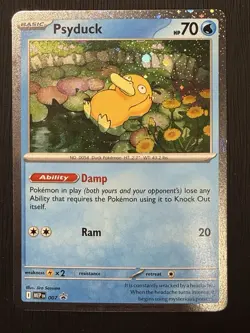 Psyduck - 007 ME: Mega Evolution Promo Cosmos Holo NM Pokemon TCG - Image 1