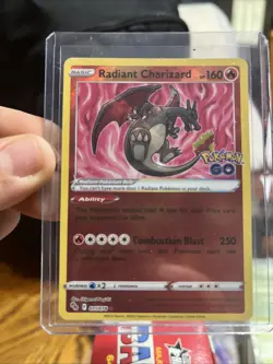 Pokemon Radiant Charizard Card with Excited Heart Ability and Combustion Blast - Image 1