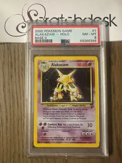 PSA 8 - Pokemon ALAKAZAM 1/130 - BASE SET 2 - FOIL Rare - Image 1