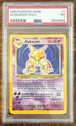 1999 Pokemon Alakazam Base Set Holo Card #1/102 Rare PSA 7 - Image 1