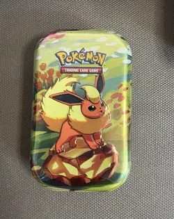 Pokemon TCG Scarlet & Violet Prismatic Evolutions Mini Tin Sealed - Image 1
