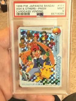 1998 POKEMON JPN BANDAI CARDDASS VENDING #111 ASH & OTHERS-PRISM PSA 9 POP28 - Image 1