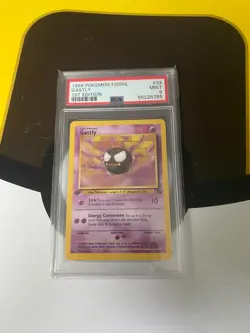 1999 POKEMON FOSSIL 1ST EDITION #33 GASTLY PSA 9 - Image 1