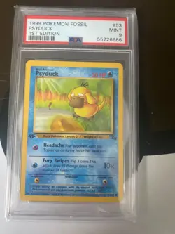 1999 Pokemon Fossil 1st Edition Psyduck #53/62 PSA 9 - Image 1