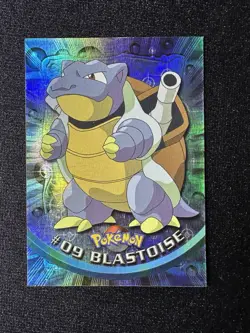 1999 Topps Pokemon Series 1 Blastoise #9 Rainbow Foil 4th Print Black Logo - Image 1