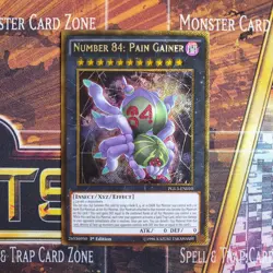 1x Number 84: Pain Gainer - Gold Secret Rare - PGL3-EN010 - 1st Ed - LP - Image 1