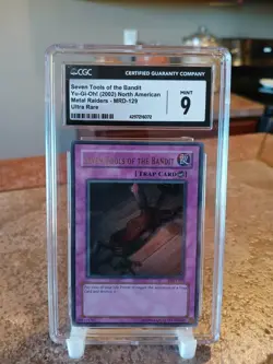 Yugioh TCG Seven Tools of the Bandit CGC 9 MRD-129 - Image 1