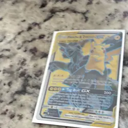 Pokemon Pikachu & Zekrom GX Ultra Rare Full Art 162/181 SM Team Up Holo English - Image 1