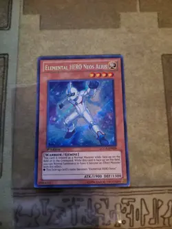 YUGIOH ELEMENTAL HERO NEOS ALIUS LCGX-EN028 SECRET 1ST ED LP - Image 1