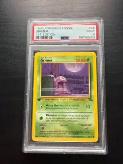 1999 Pokemon Fossil #48 Grimer 1st Edition PSA 9 - Image 1