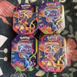 Set of Mega Charizard Ex 2026 Pokemon tins - Image 1
