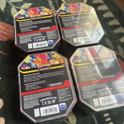 Set of Mega Charizard Ex 2026 Pokemon tins - Image 3