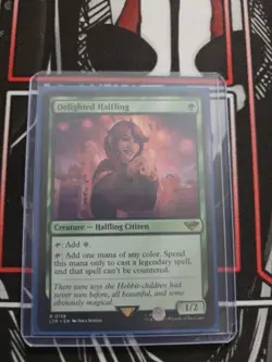 1x MTG Delighted Halfling - Universes Beyond: The Lord of the Rings (LTR) #158 - Image 1