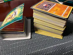Random Pokemon Cards Lot with small book of cards included - Image 1