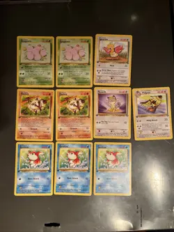 Ten 1st Edition Pokemon Card lot - Image 1