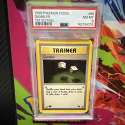 Pokemon Gambler Trainer Fossil 1st Edition 60/62 Regular English PSA 8 - Image 1