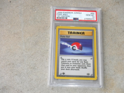 1999 POKEMON JUNGLE POKE BALL 1ST EDITION TRAINER CARD #64 POKEMON PSA 10 - Image 1