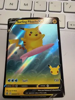 Pokemon TCG Surfing Pikachu v Celebrations Holo Ultra Rare Card 008/025 - Image 1