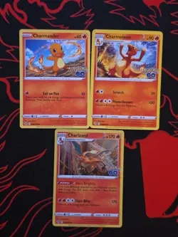 CHARMANDER CHARMELEON CHARIZARD Sword & Shield Pokemon Go 2022 EVOLUTION HOLO LP - Image 1